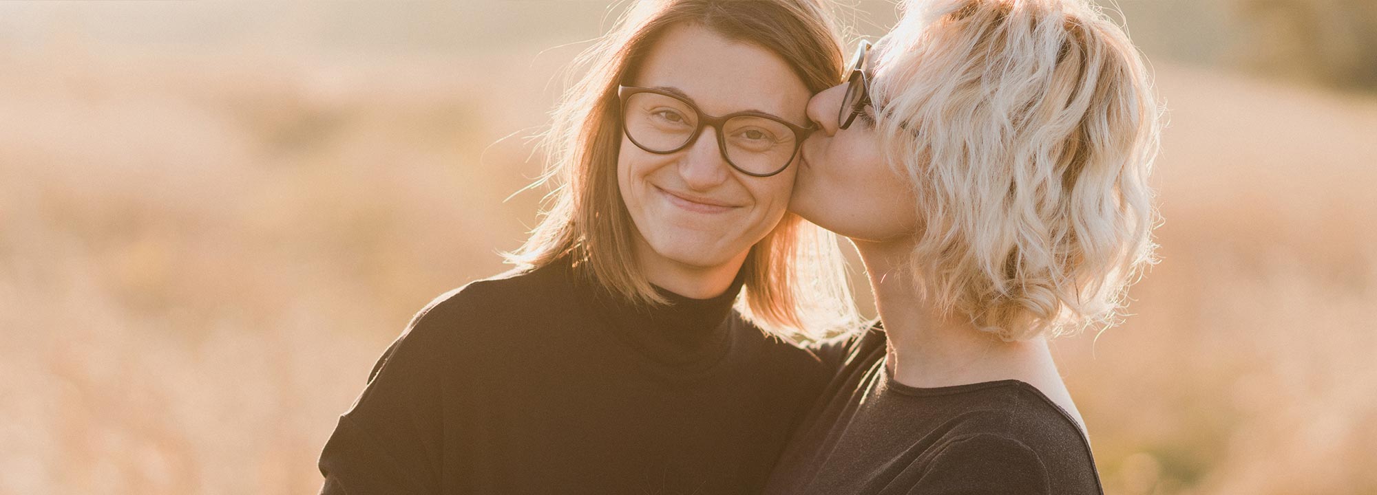 2 women embracing each other